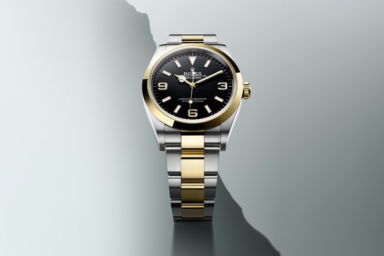 Rolex Explorer 36 in Oystersteel and yellow gold, featuring a black dial, engineered for precision in the world’s most demanding environments.
