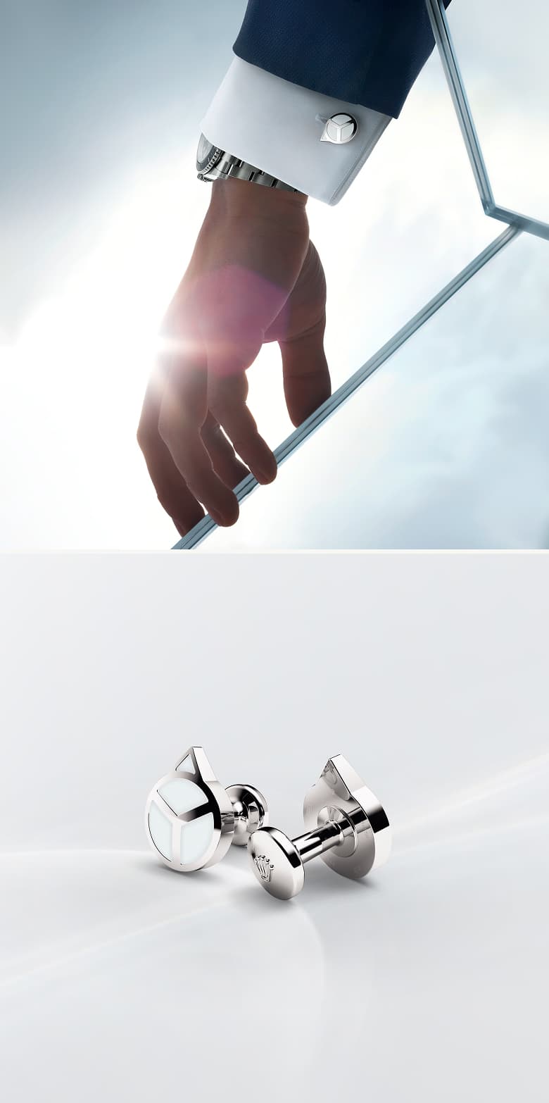 Rolex Accessories: Two images of Rolex 'Hand' cufflinks in white gold, shown modelled on a sleeve on top and in close-up view below. - DAFC