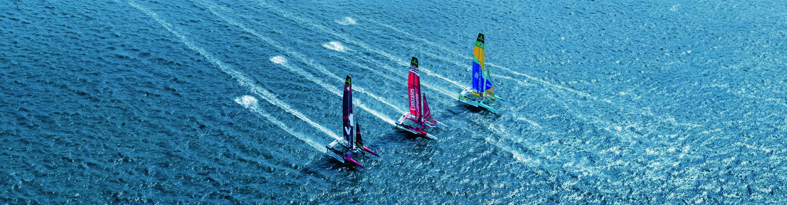 World of Rolex - Ultralight SailGP catamarans race at remarkable speed across open water, reflecting the precision, innovation and global spirit of the Rolex SailGP Championship. - DAFC