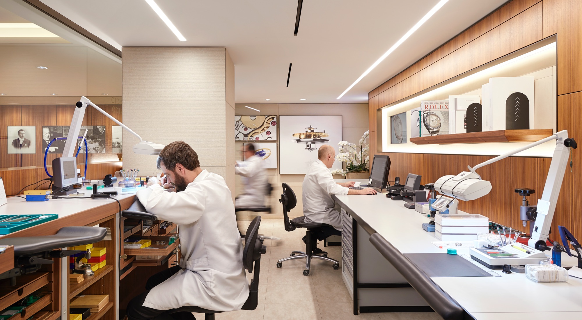 Watchmakers at work in a Rolex Authorised Service Centre.