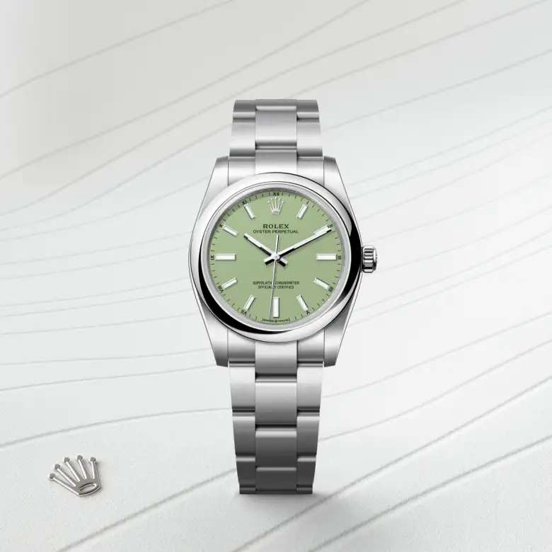 The Rolex Oyster Perpetual 34 in Oystersteel shown against a muted elegant background.