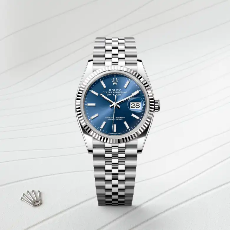 The Rolex Datejust 36 in Oystersteel and white gold shown against a muted elegant background.