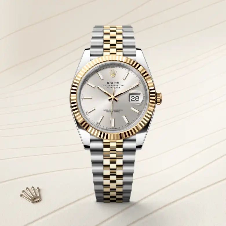 The Rolex Datejust 41 in Oystersteel and yellow gold shown against a muted elegant background.