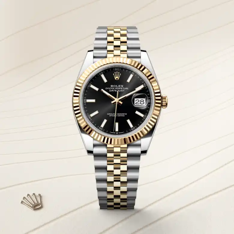 The Rolex Datejust 41 in Oystersteel and yellow gold shown against a muted elegant background.