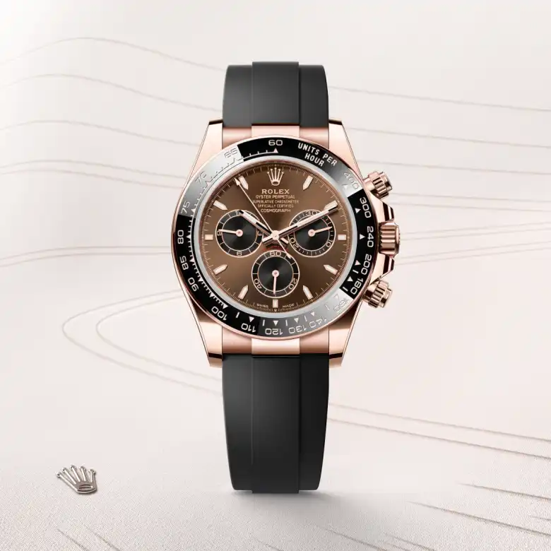 The Rolex Cosmograph Daytona in Everose gold shown against a muted elegant background.