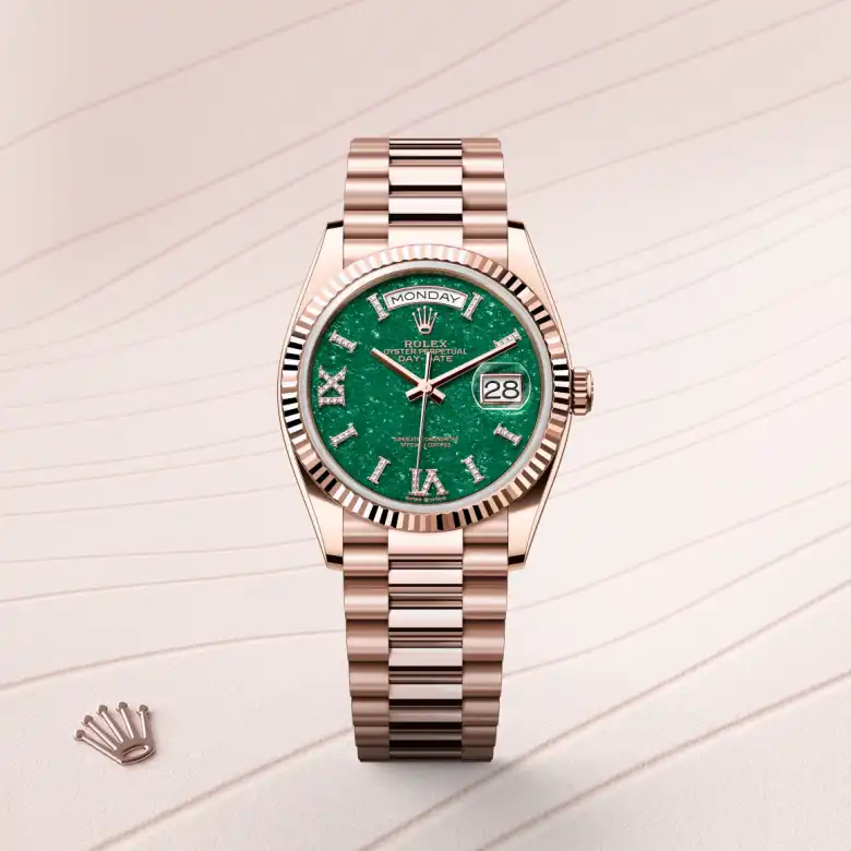 The Rolex Day-Date 36 in Everose gold shown against a muted elegant background.