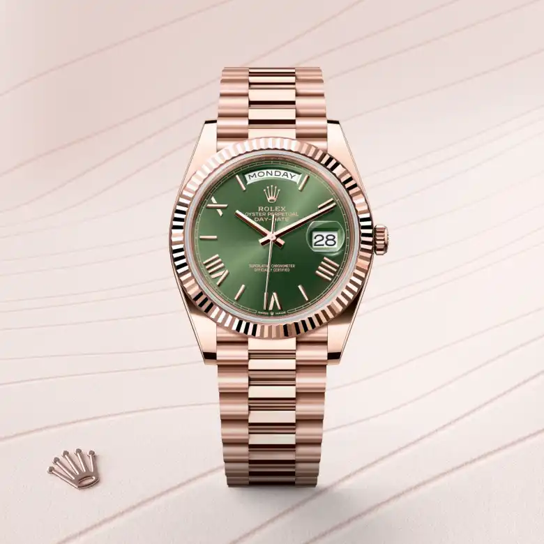 The Rolex Day-Date 40 in Everose gold shown against a muted elegant background.