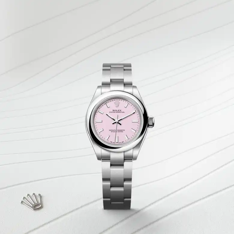 The Rolex Oyster Perpetual 28 in Oystersteel shown against a muted elegant background.