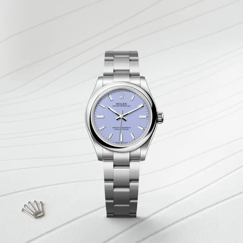 The Rolex Oyster Perpetual 31 in Oystersteel shown against a muted elegant background.