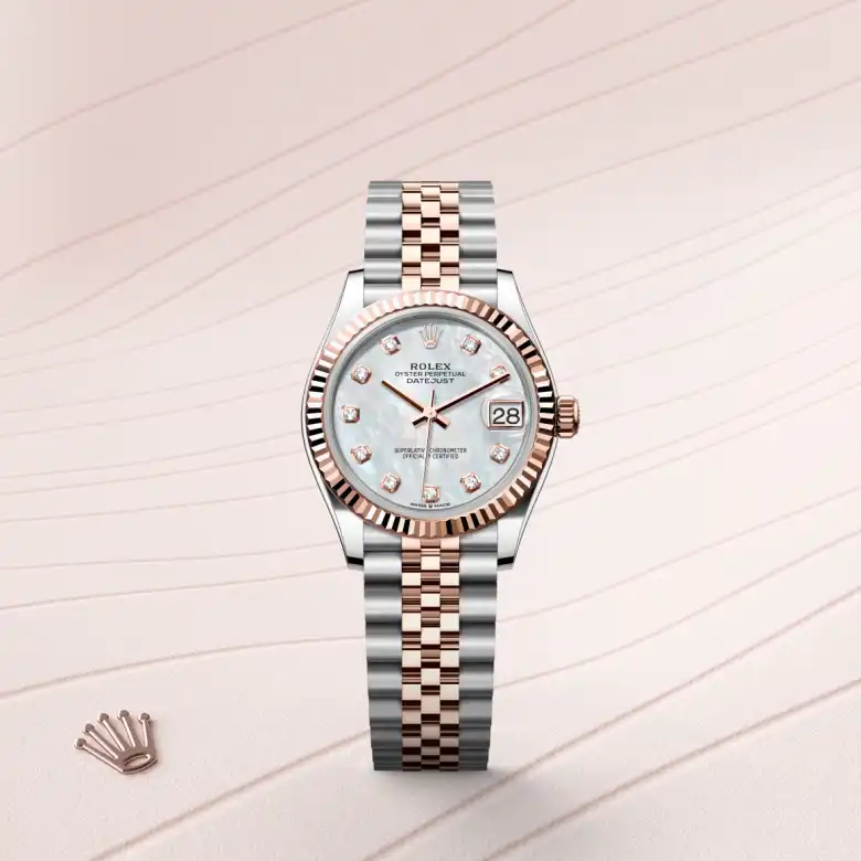 The Rolex Datejust 31 in Oystersteel and Everose gold shown against a muted elegant background.