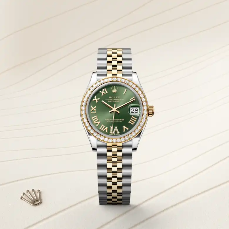The Rolex Datejust 31 in Oystersteel, yellow gold and diamonds shown against a muted elegant background.