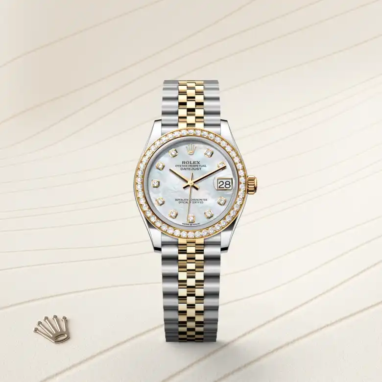 The Rolex Datejust 31 in Oystersteel, yellow gold and diamonds shown against a muted elegant background.