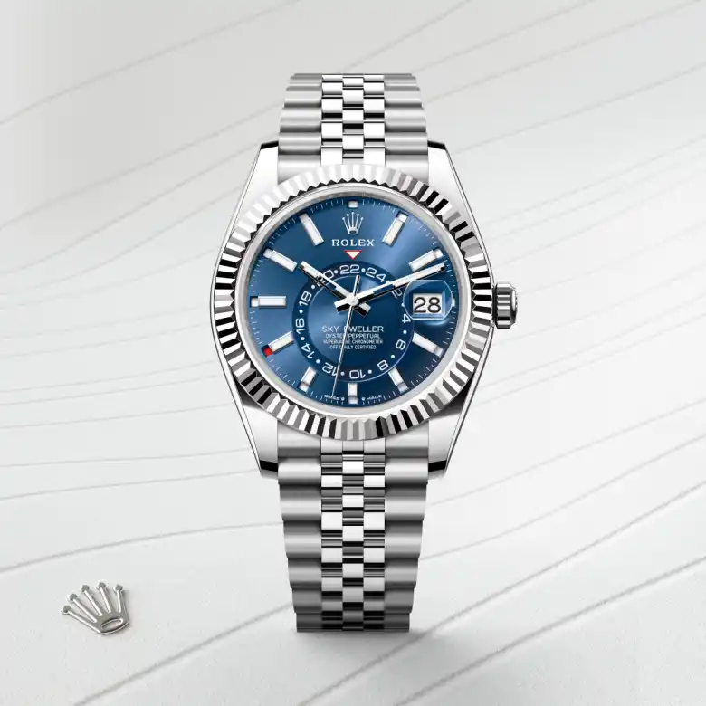The Rolex Sky-Dweller in Oystersteel and white gold shown against a muted elegant background.