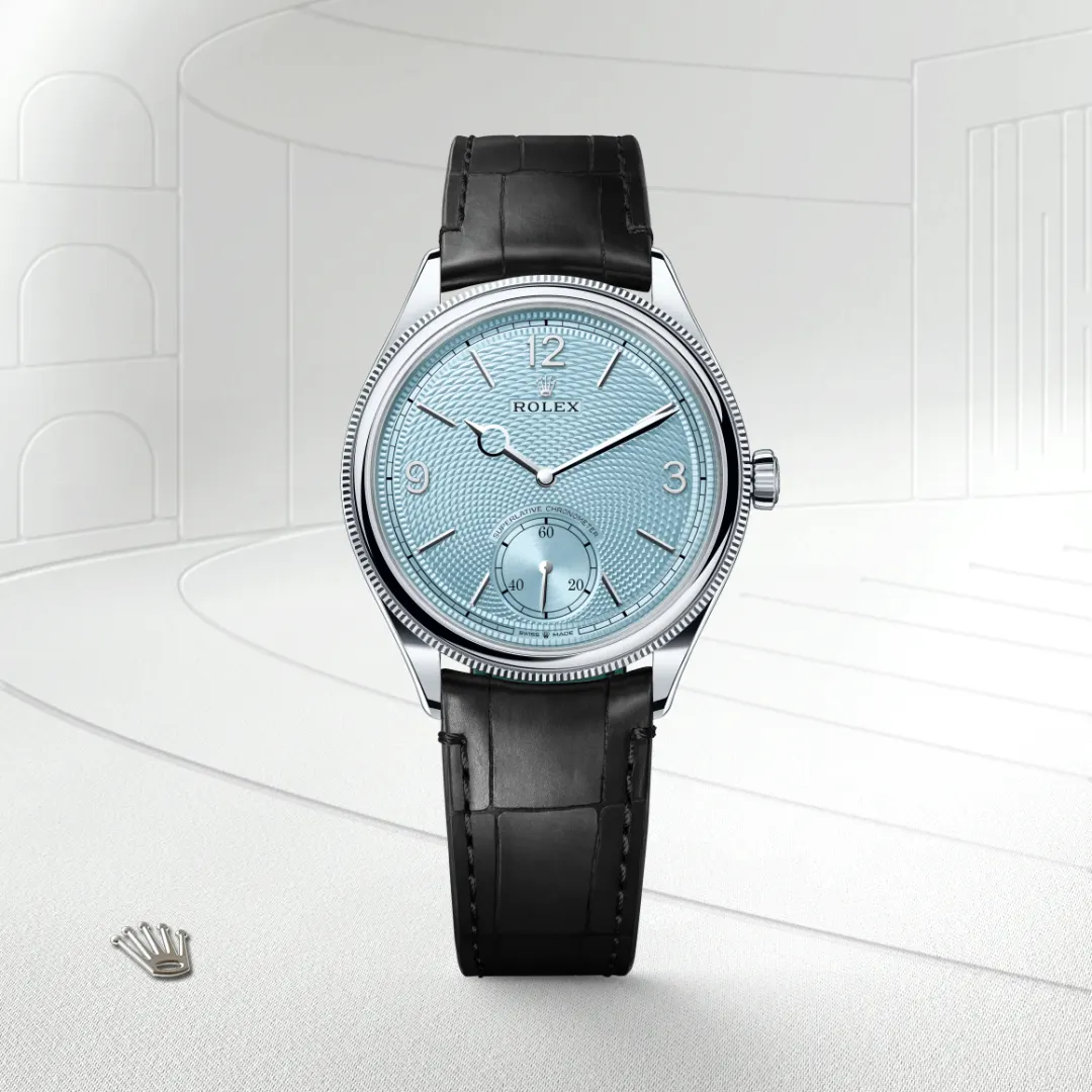 The Rolex 1908 in platinum, polished finish shown against a muted elegant background.