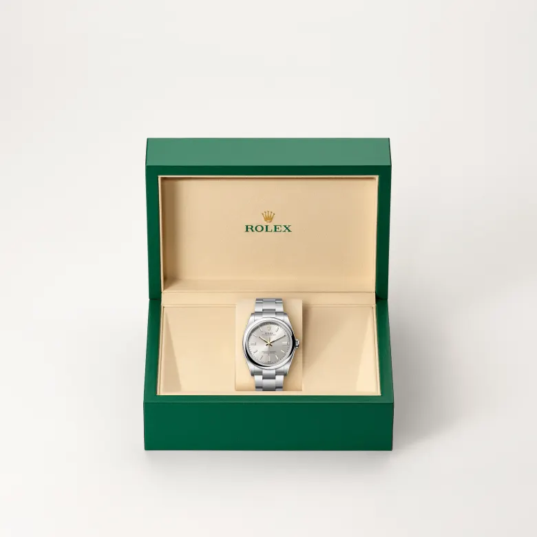 The Rolex Oyster Perpetual 36 in Oystersteel in the Rolex presentation box.