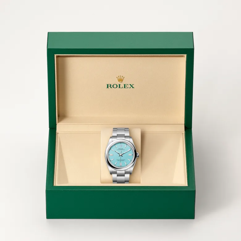 The Rolex Oyster Perpetual 36 in Oystersteel in the Rolex presentation box.