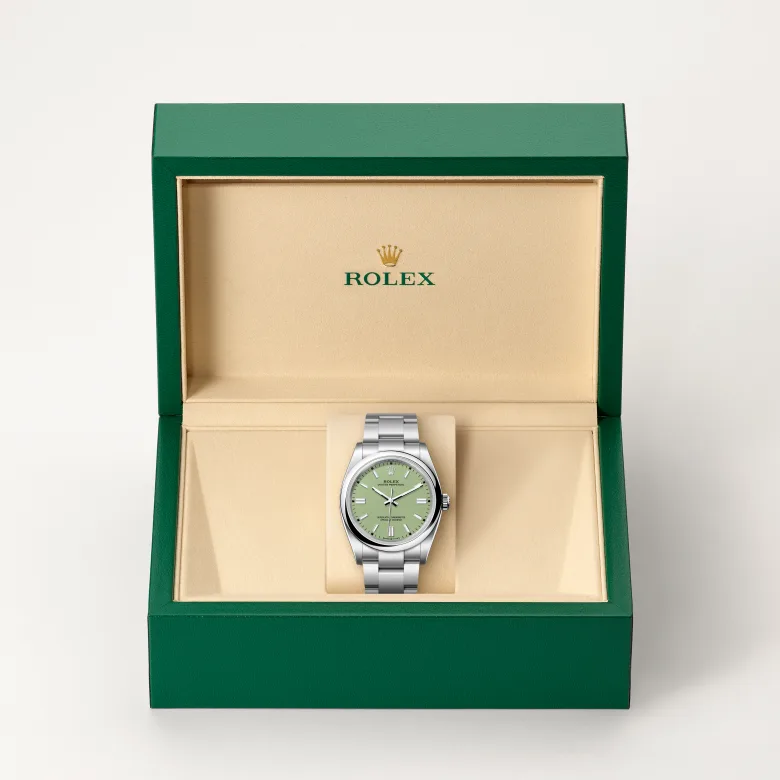The Rolex Oyster Perpetual 36 in Oystersteel in the Rolex presentation box.