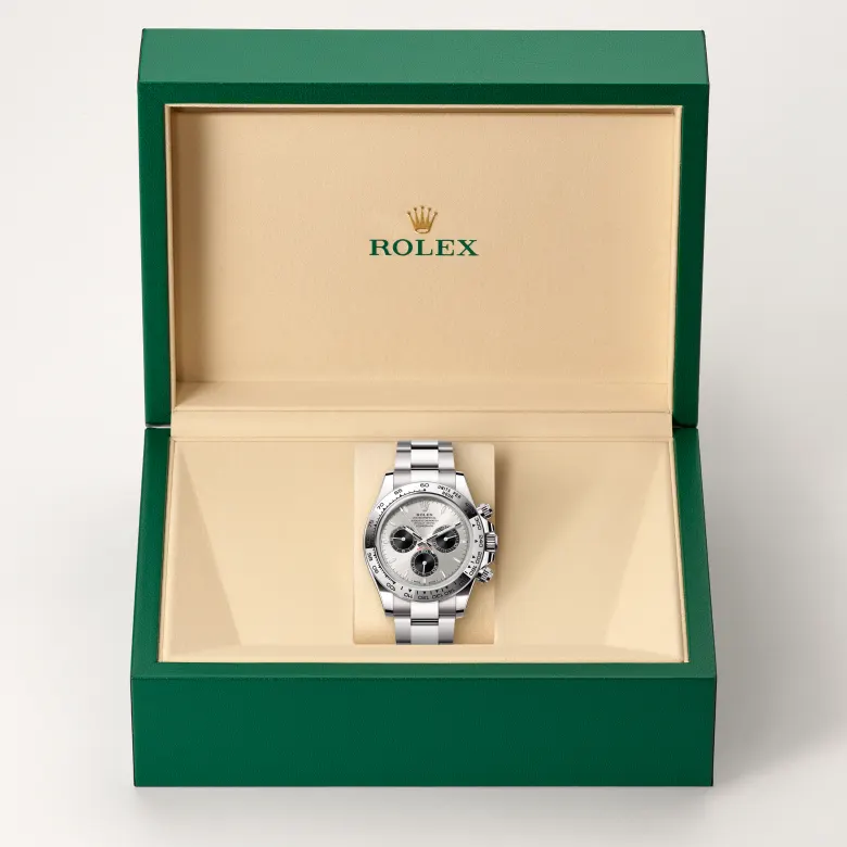The Rolex Cosmograph Daytona in white gold in the Rolex presentation box.