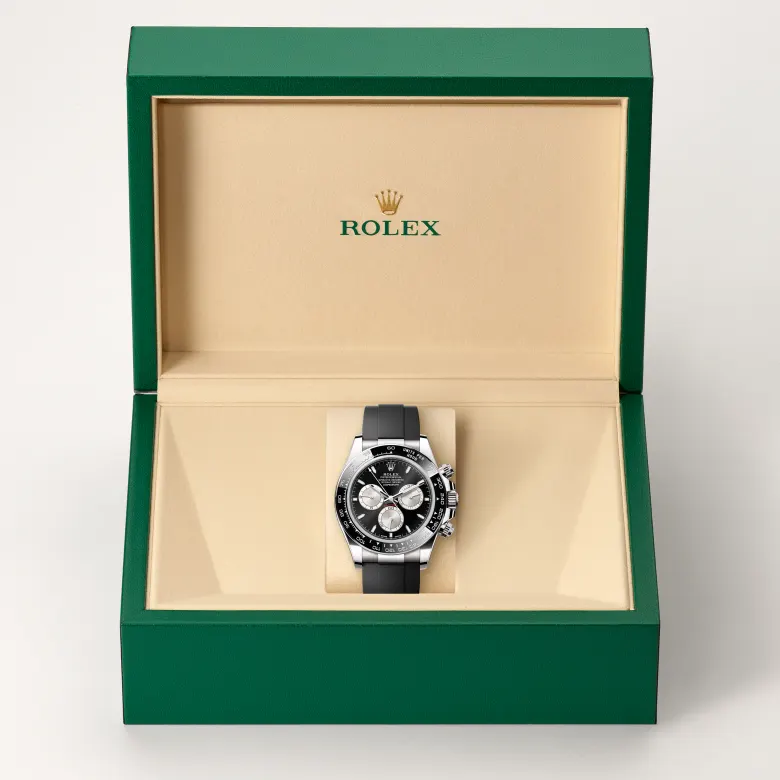 The Rolex Cosmograph Daytona in white gold in the Rolex presentation box.