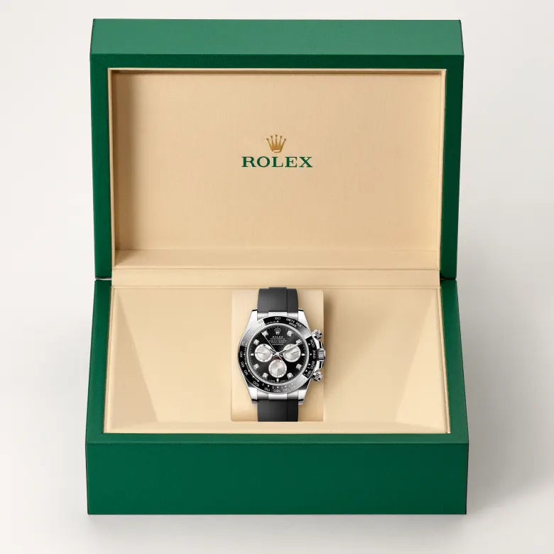 The Rolex Cosmograph Daytona in white gold in the Rolex presentation box.