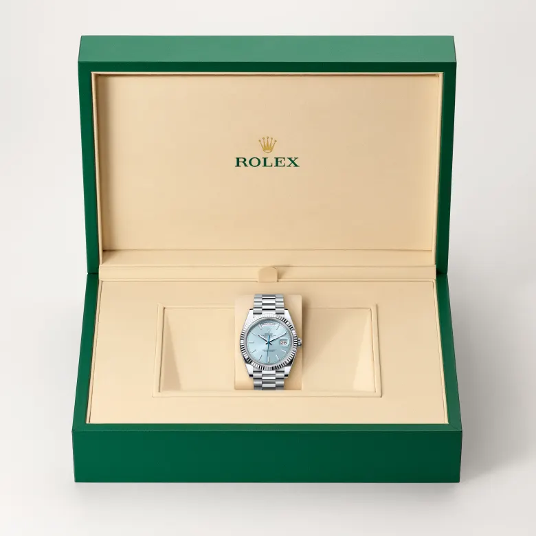 The Rolex Day-Date 40 in platinum in the Rolex presentation box.
