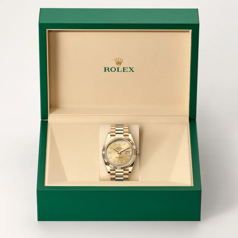 The Rolex Day-Date 40 in yellow gold in the Rolex presentation box.