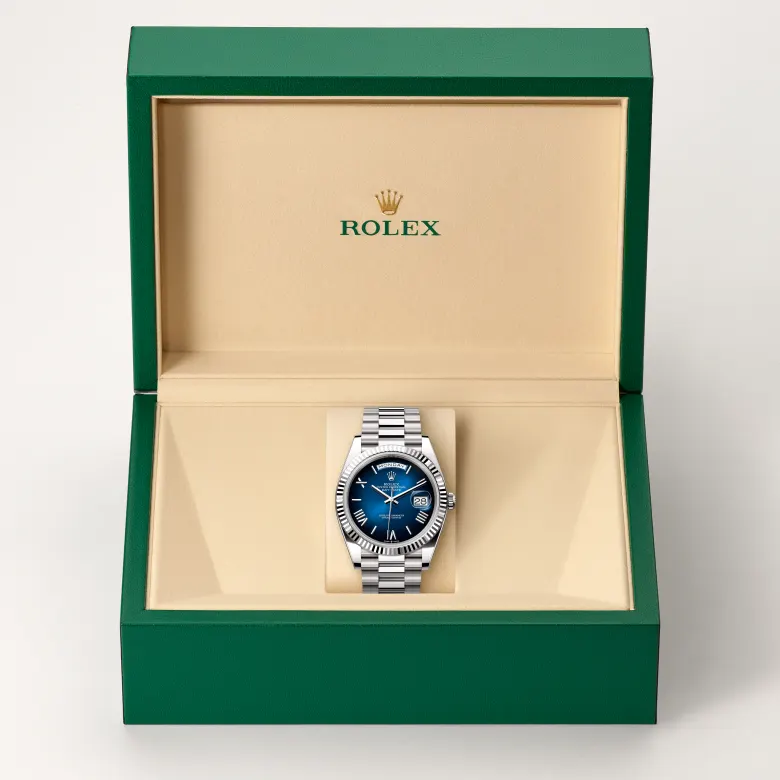 The Rolex Day-Date 40 in white gold in the Rolex presentation box.