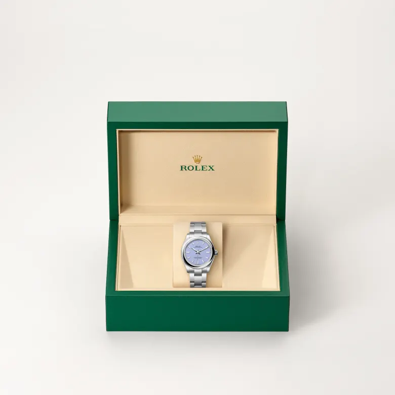 The Rolex Oyster Perpetual 31 in Oystersteel in the Rolex presentation box.
