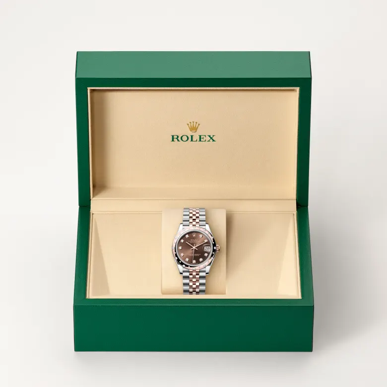 The Rolex Datejust 31 in Oystersteel, Everose gold and diamonds in the Rolex presentation box.