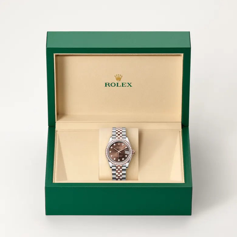 The Rolex Datejust 31 in Oystersteel, Everose gold and diamonds in the Rolex presentation box.