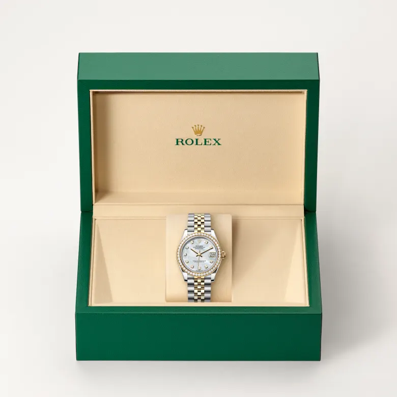 The Rolex Datejust 31 in Oystersteel, yellow gold and diamonds in the Rolex presentation box.