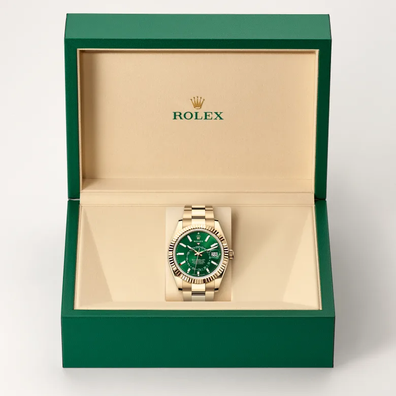 The Rolex Sky-Dweller in yellow gold in the Rolex presentation box.