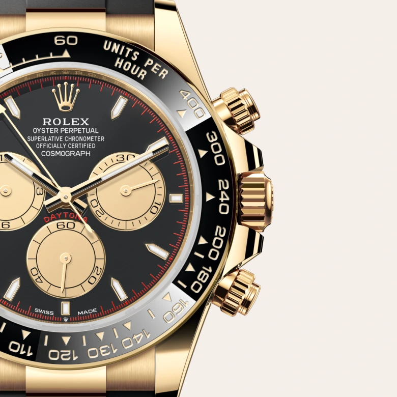 A close-up view of the Rolex Cosmograph Daytona in yellow gold.