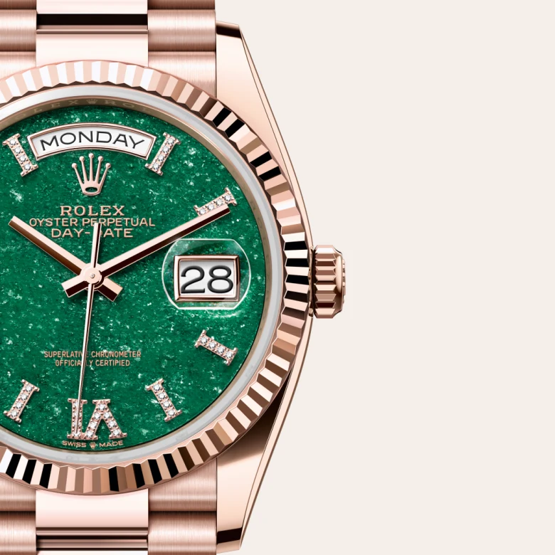 A close-up view of the Rolex Day-Date 36 in Everose gold.