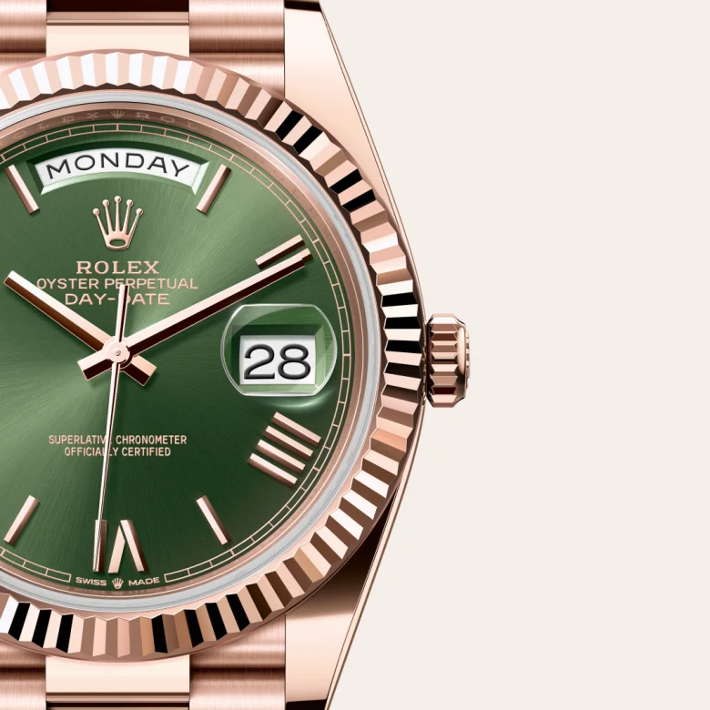 A close-up view of the Rolex Day-Date 40 in Everose gold.