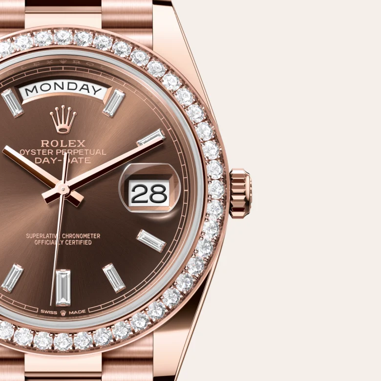 A close-up view of the Rolex Day-Date 40 in Everose gold and diamonds.
