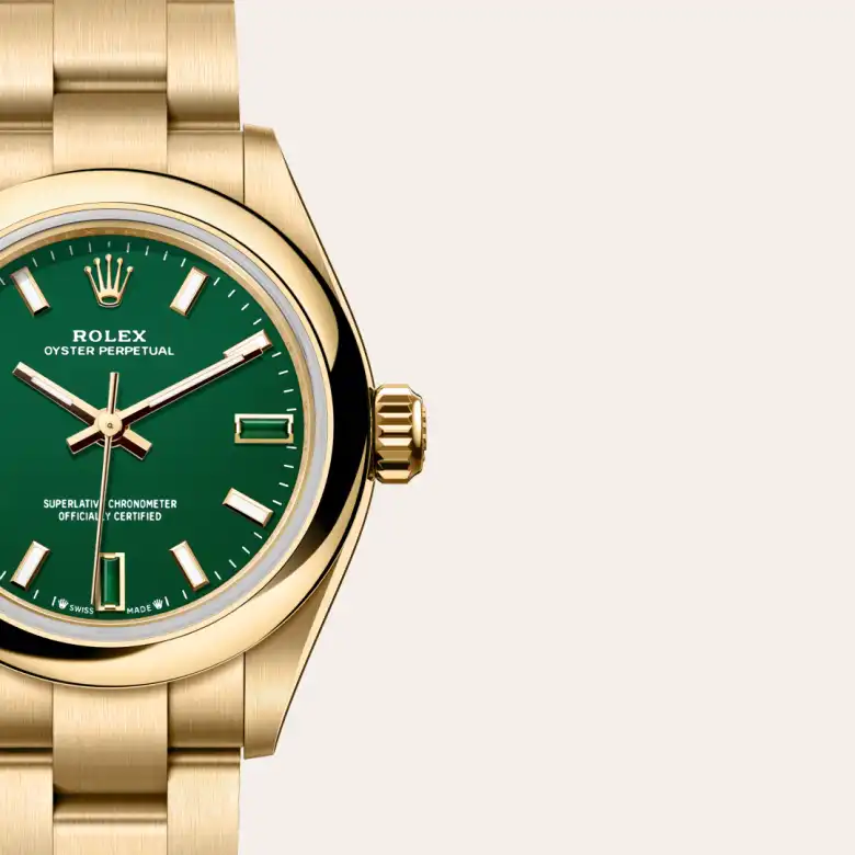 A close-up view of the Rolex Oyster Perpetual 28 in yellow gold.