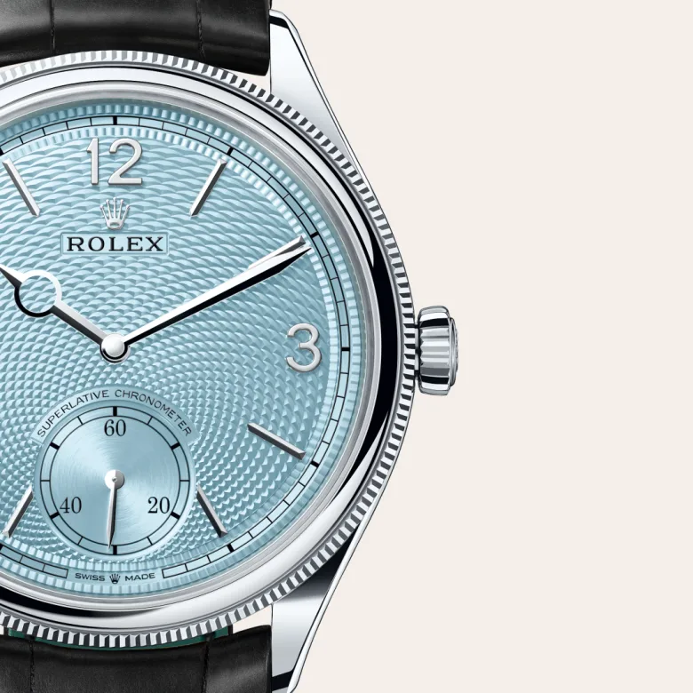 A close-up view of the Rolex 1908 in platinum, polished finish.